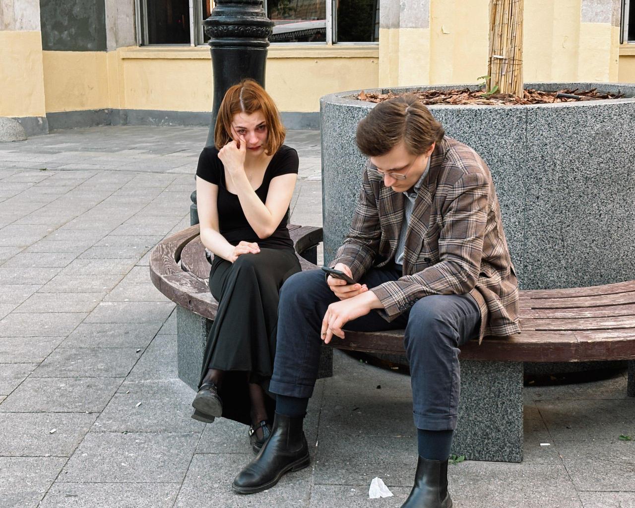 Distressed teenagers sit together on a bench, illustrating rising suicidal thoughts and mental health challenges among children and adolescents